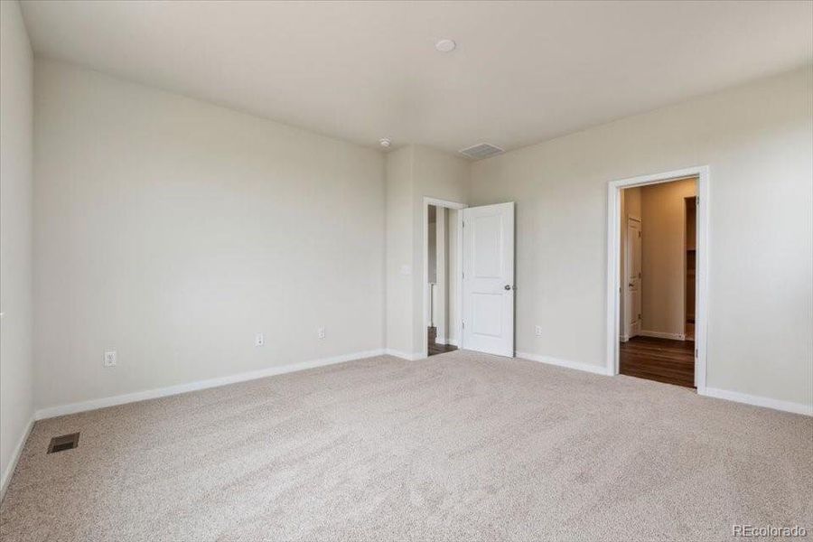 Spacious, unfurnished interior of a new home in Red Barn Meadows, Mead (Image 16).