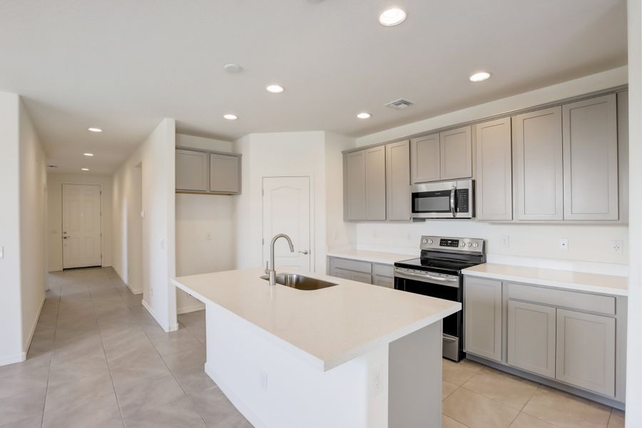 Representative furnished interior of a home built from the Castillo Series - Bluebell by Brightland Homes in Castillo at Anderson Parc, Buckeye (Image 5).
