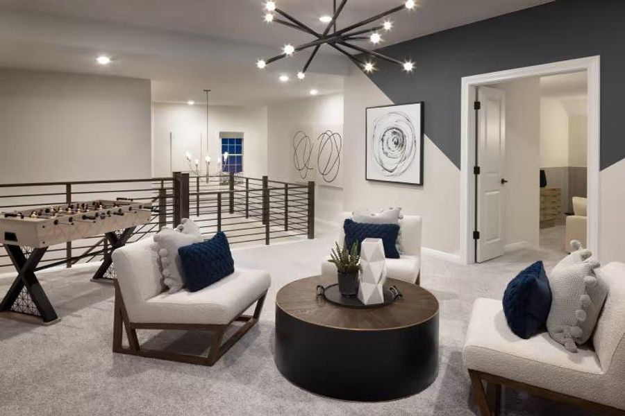 Photo of Pulte model home with same floor plan, not of actual home listed. Photo of Pulte model home with same floor plan, not of actual home listed.