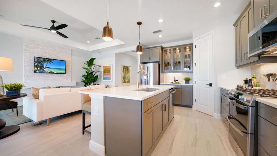 Representative furnished interior of a home built from the Meadow Brook by Neal Communities in SkySail, Naples (Image 12).