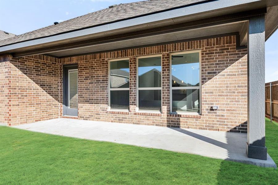 Exterior details and patio area of a home in Georgetown at Kings Fort, Kaufman (Image 4).