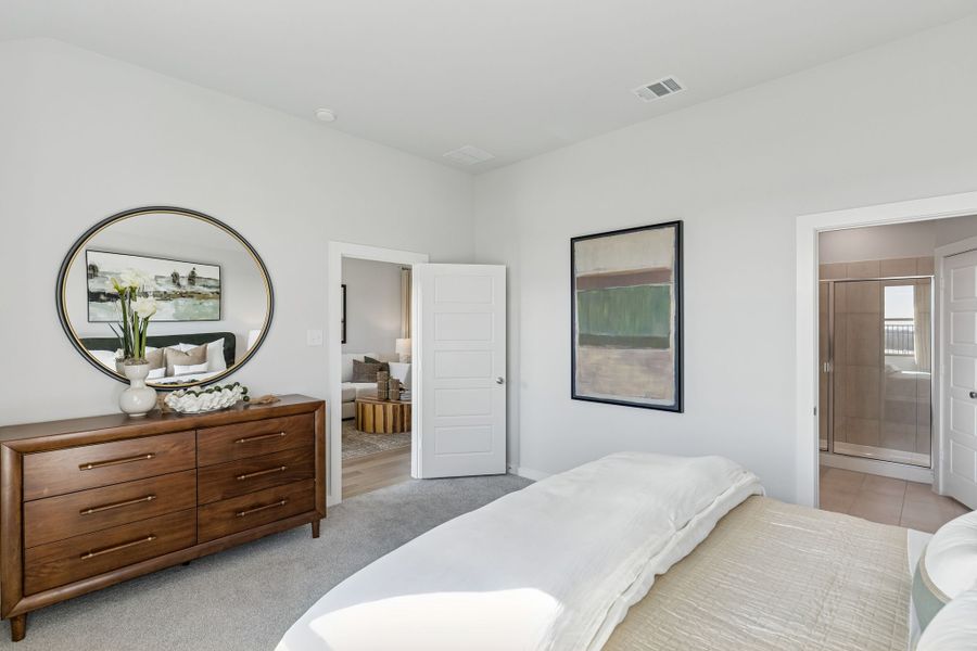 Primary Suite in a Nicholson Ranch Magnolia Model Home in Lavon TX by Trophy Signature Homes