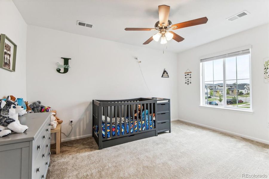 Bedroom 1 - fan, lots of light and carpet