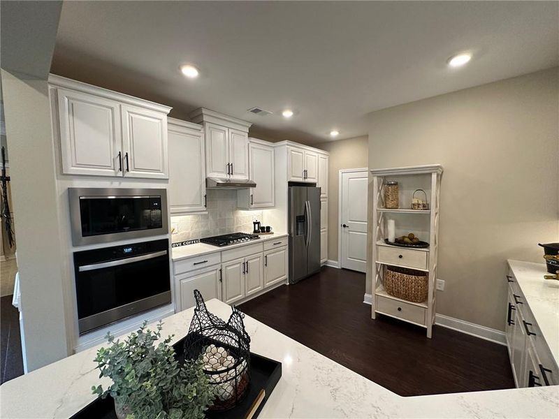 Furnished interior view inside a new home in , Cumming (Image 9). Furnished interior view inside a new home in , Cumming (Image 9).