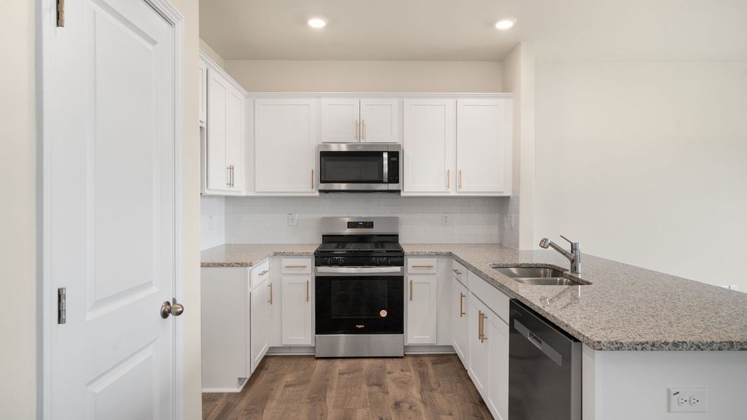 Furnished interior view inside a new home in Clock Road Townhomes, New Bern (Image 5). Furnished interior view inside a new home in Clock Road Townhomes, New Bern (Image 5).