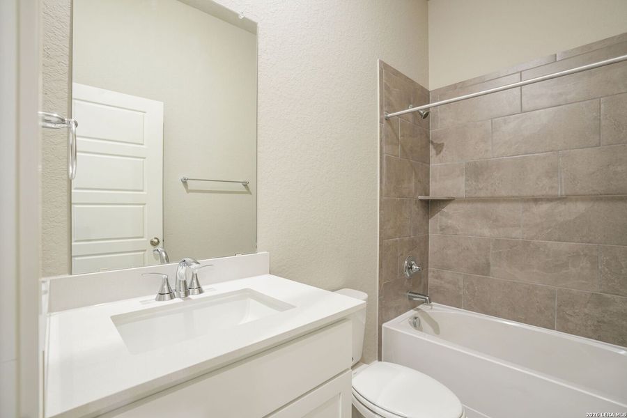 Furnished interior view inside a new home in Estancia Ranch - Classic Series, San Antonio (Image 10).