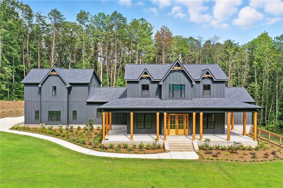 Front exterior of a new home in , Ball Ground, GA, highlighting curb appeal (Image 27).