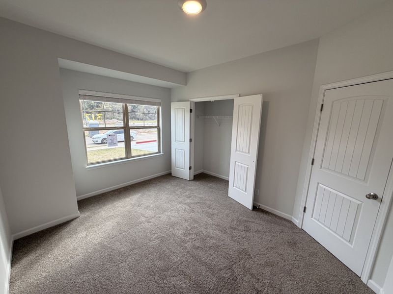 Bedroom #2 featuring the front Bump Out