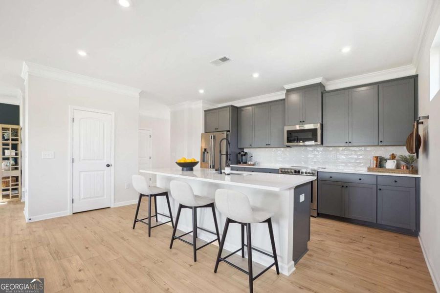 Furnished interior view inside a new home in Trellis Park, Hampton (Image 6).