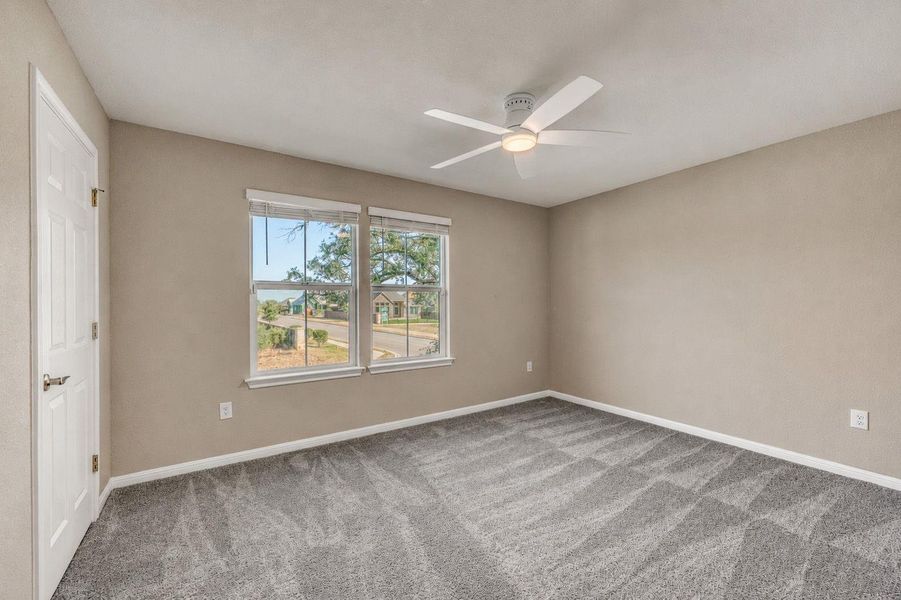Plush wall-to-wall carpeting and twin windows overlooking the neighborhood create a comfortable atmosphere. Plush wall-to-wall carpeting and twin windows overlooking the neighborhood create a comfortable atmosphere.