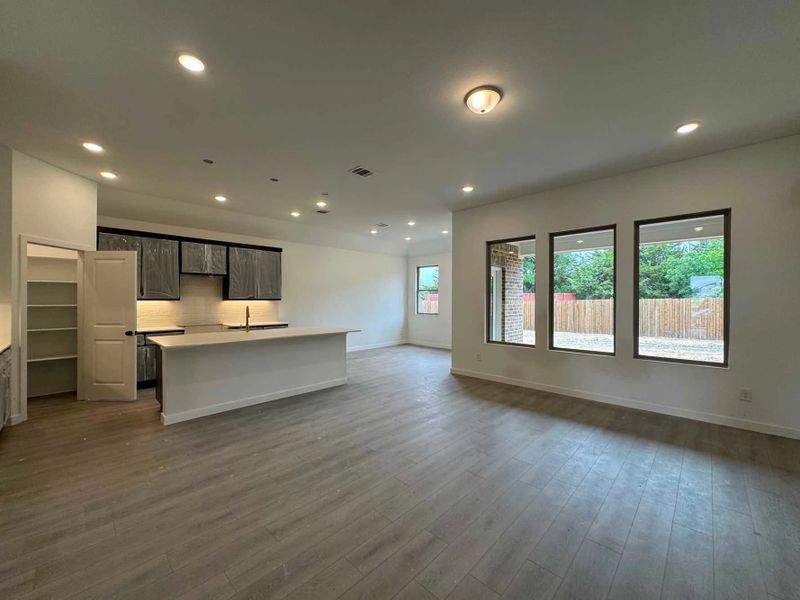 Open Kitchen-Living-Dining Room Construction Progress featuring the Oxford Collection