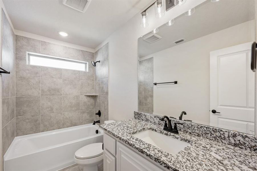 Furnished interior view inside a new home in Mockingbird Hills 60-65, Joshua (Image 8).