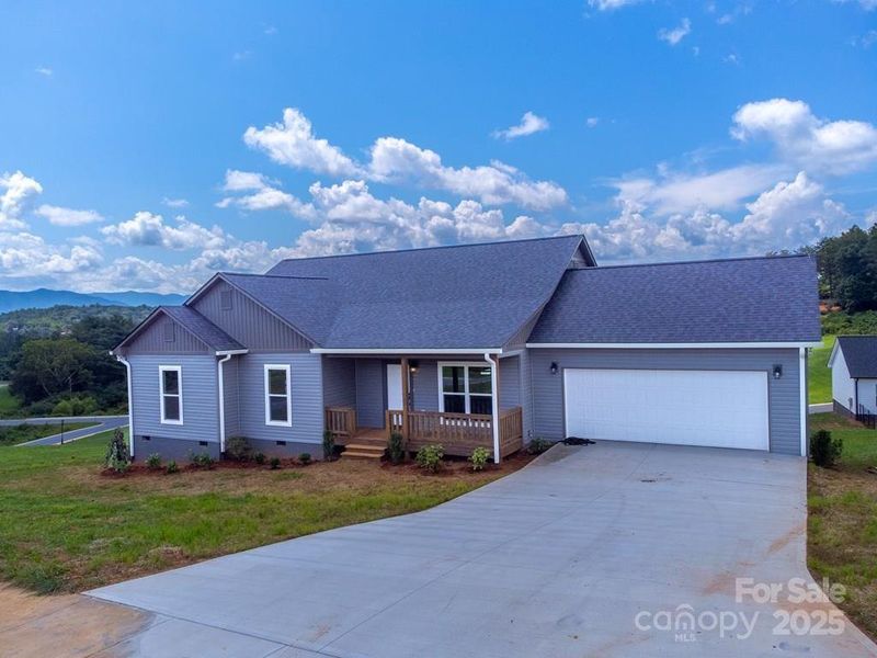 Front exterior of a new home in , Franklin, NC, highlighting curb appeal (Image 17). Front exterior of a new home in , Franklin, NC, highlighting curb appeal (Image 17).
