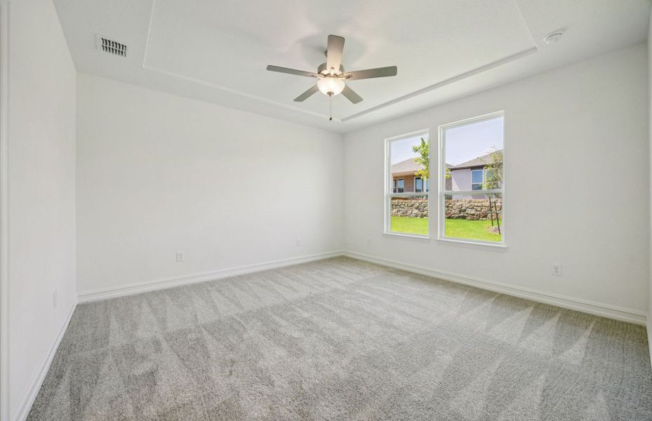 Elegant owner's suite with large windows and private bathroom Elegant owner's suite with large windows and private bathroom