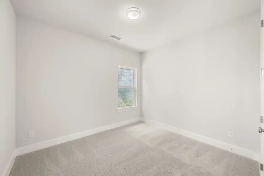 Representative unfurnished interior of a home built from the Liberty by Rockwell Homes in Wildflower Ranch, Justin (Image 34).