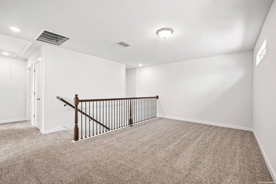 Spacious, unfurnished interior of a new home in Weston Oaks, San Antonio (Image 28).