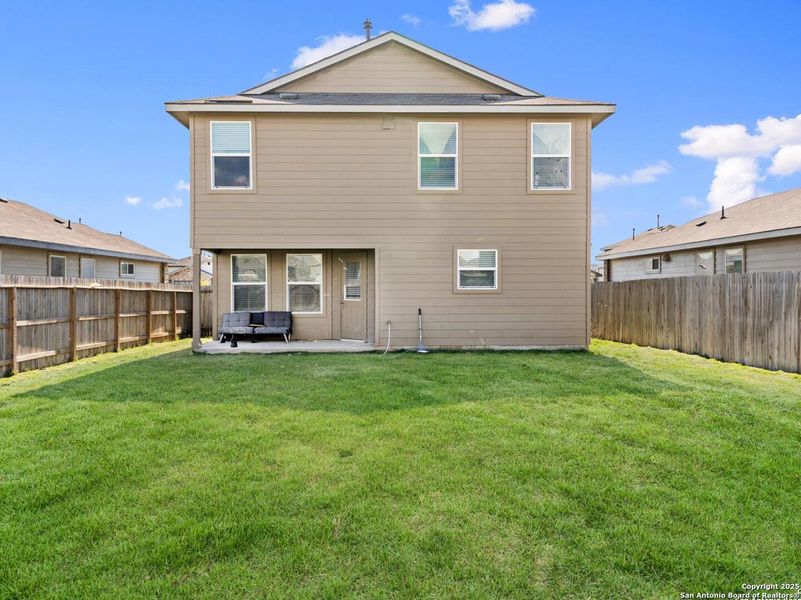 Exterior details and patio area of a home in Whisper Falls, San Antonio (Image 17).