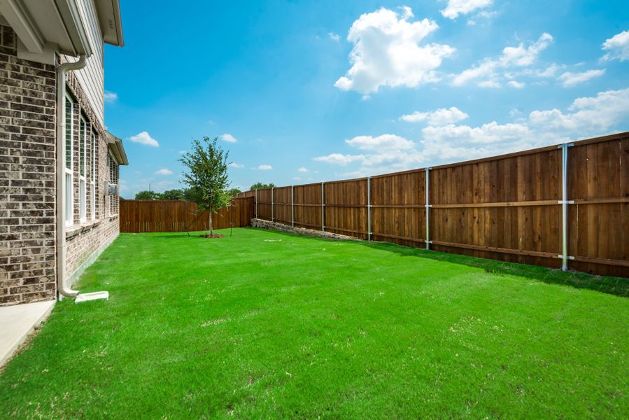 Spacious, fenced-in backyard