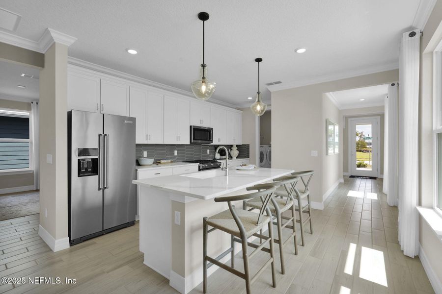 Furnished interior view inside a new home in Summer Bay at Grand Oaks, St. Augustine (Image 6).
