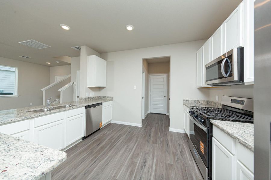 Furnished interior view inside a new home in Cliffstone Hills, Conroe (Image 7).
