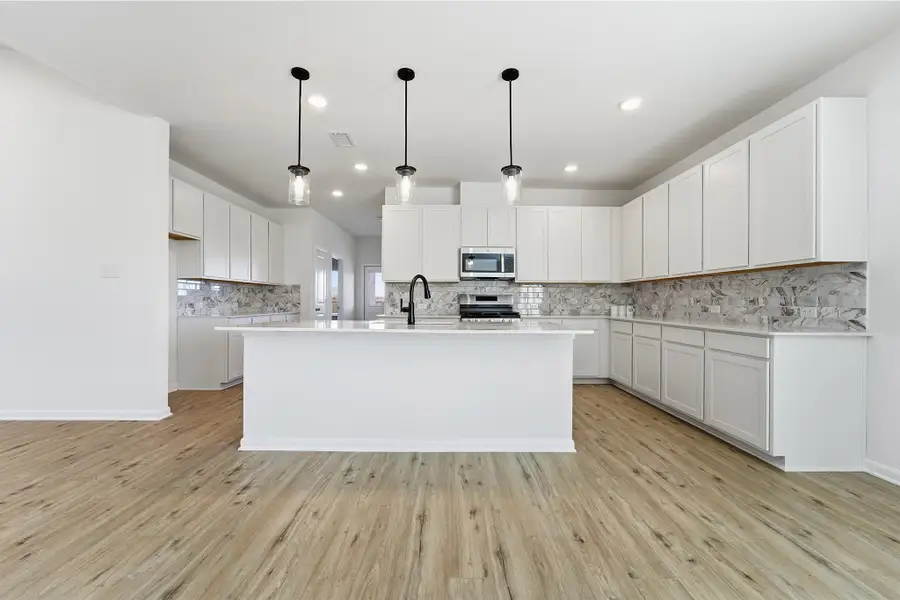 Furnished interior view inside a new home in Pebblebrook, Sherman (Image 7).