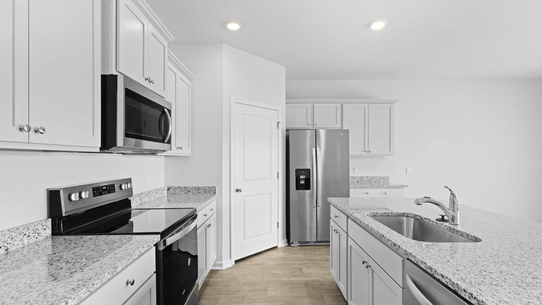 Furnished interior view inside a new home in The Ranch, Holly Hill (Image 2).