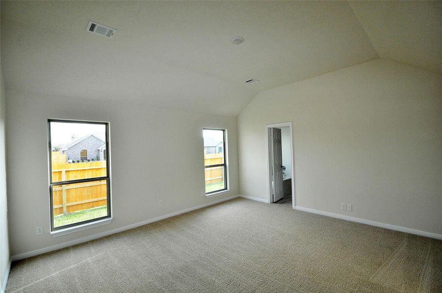 Master Bedroom ceiling vaults to 10 feet.