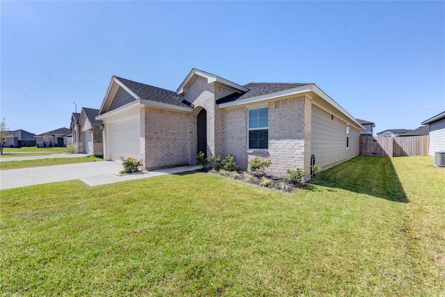 Front exterior of a new home in , Fulshear, TX, highlighting curb appeal (Image 20).