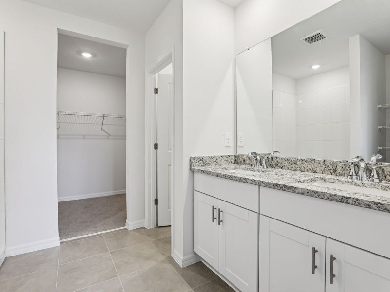 Furnished interior view inside a new home in The Grove at Stuart Crossing - Classic Series, Bartow (Image 5).