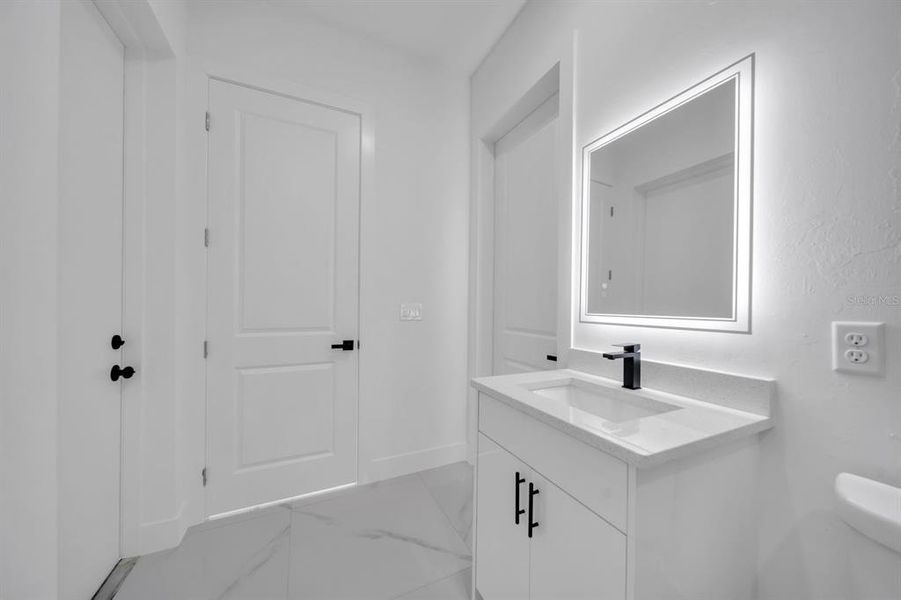 Furnished interior view inside a new home in , Lehigh Acres (Image 8).