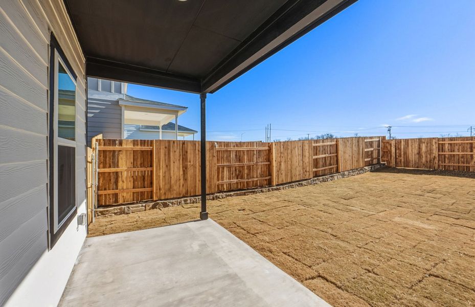 Exterior details and patio area of a home in Sunfield, Buda (Image 24).