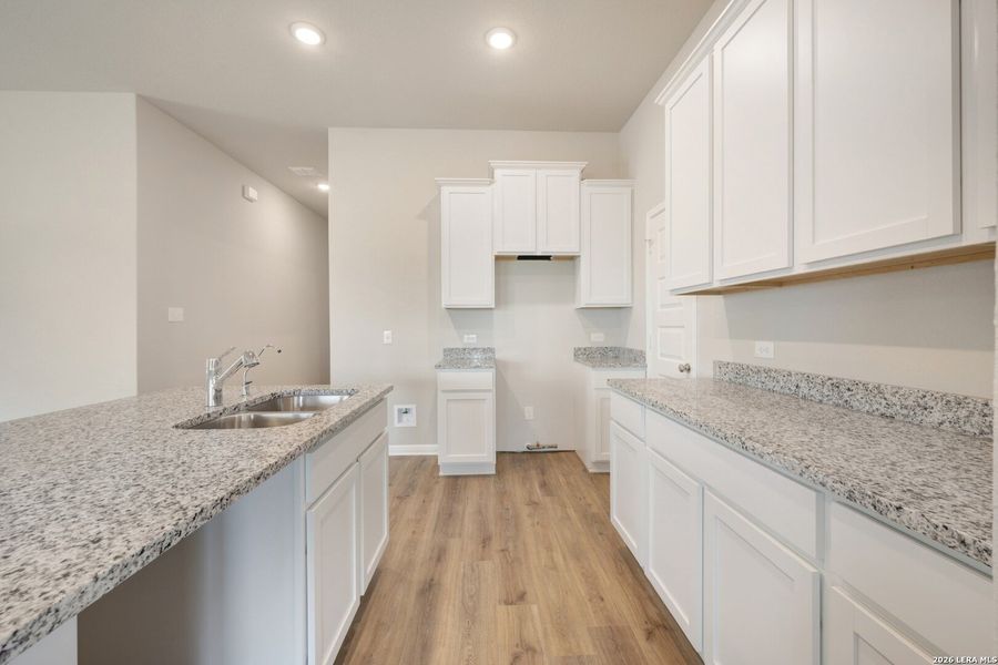 Furnished interior view inside a new home in Mesquite Ridge, San Antonio (Image 8).