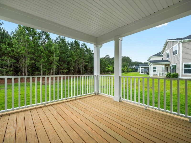 Exterior details and patio area of a home in The Coves at Lakes of Cane Bay, Summerville (Image 24).