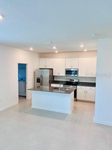 Furnished interior view inside a new home in , Kissimmee (Image 9). Furnished interior view inside a new home in , Kissimmee (Image 9).