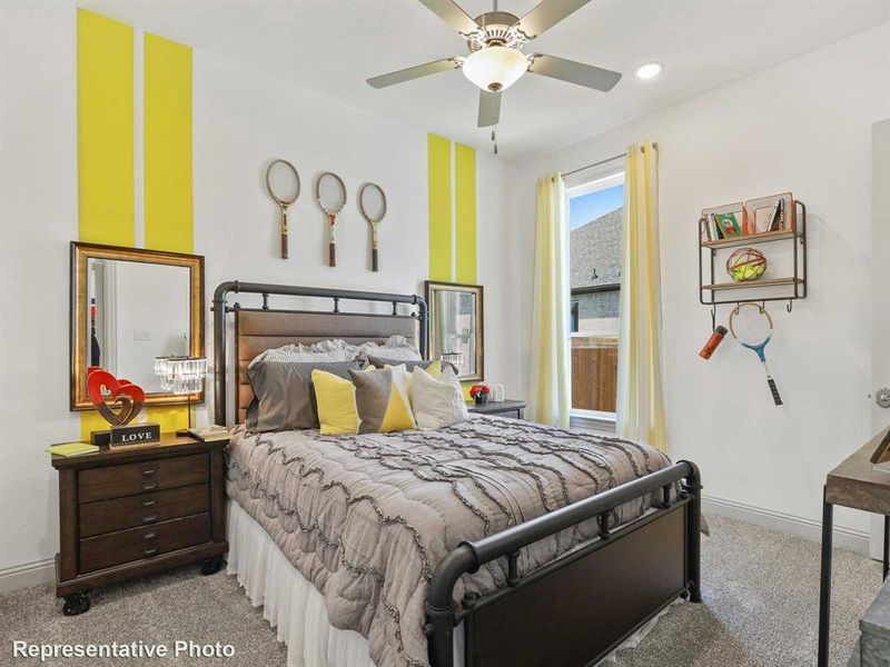 Bedroom with carpet, a ceiling fan, and recessed lighting Bedroom with carpet, a ceiling fan, and recessed lighting