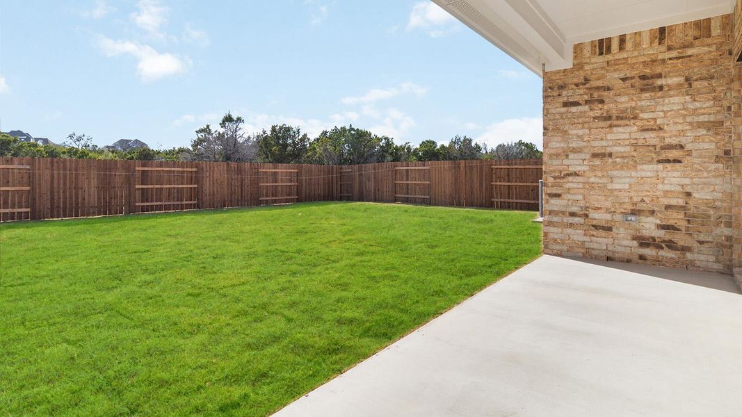 Exterior details and patio area of a home in Bar W Ranch, Leander (Image 3).