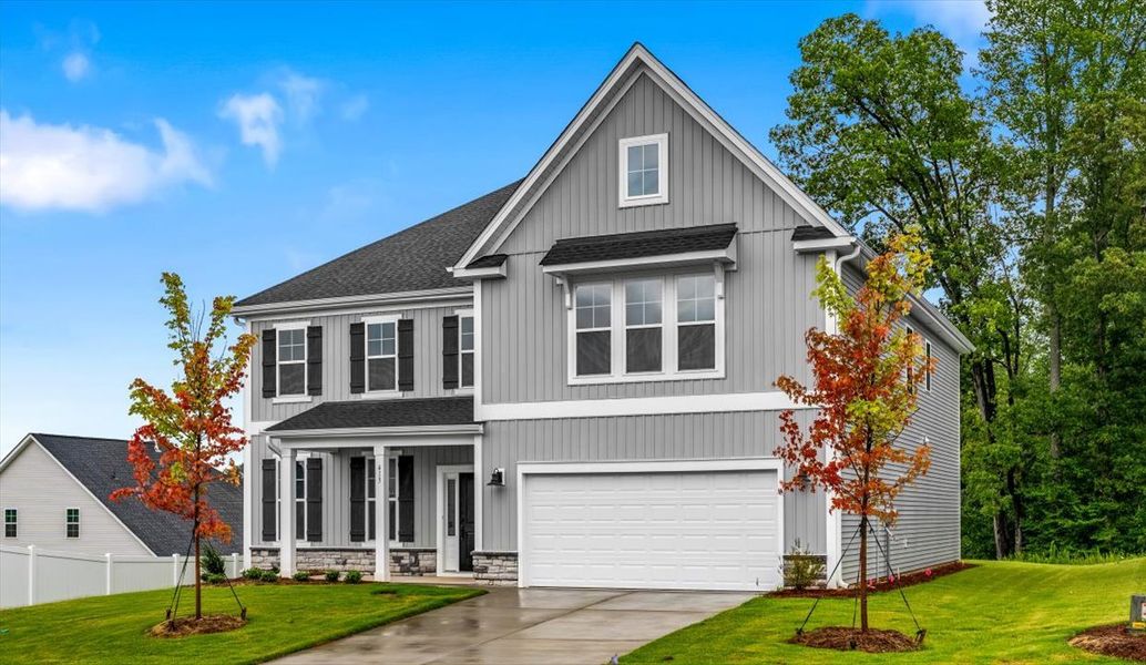 Front exterior of a new home in Fieldstone, Lexington, NC, highlighting curb appeal (Image 26). Front exterior of a new home in Fieldstone, Lexington, NC, highlighting curb appeal (Image 26).