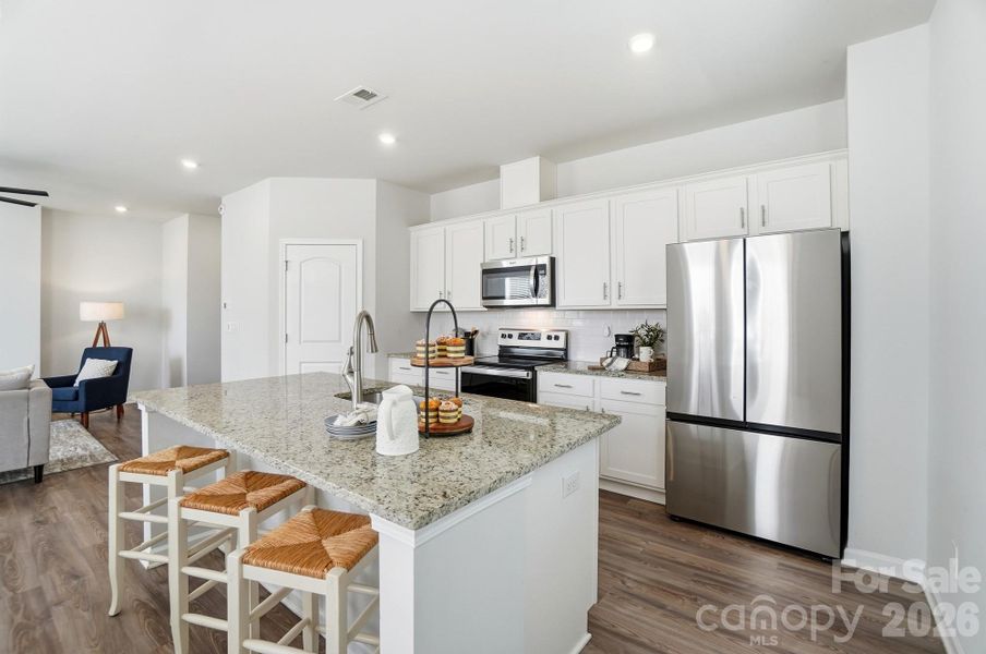 Furnished interior view inside a new home in , Monroe (Image 15).
