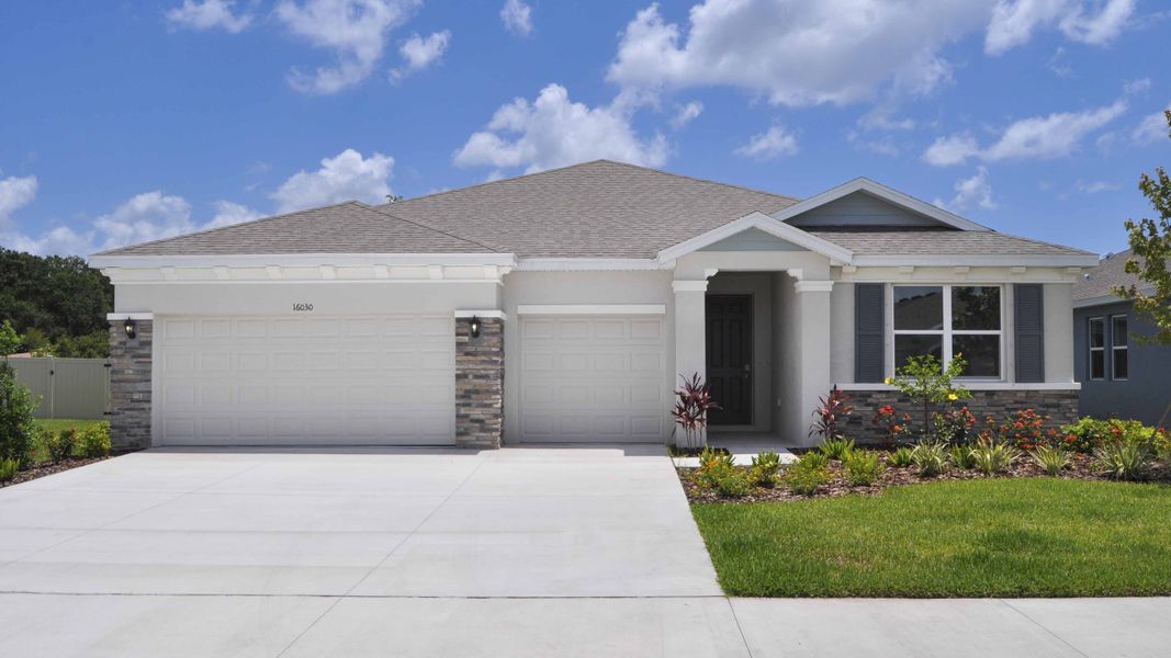 Representative exterior photo of a completed home built from the Camden by D.R. Horton in Oakfield Trails, Parrish, FL (Image 22).