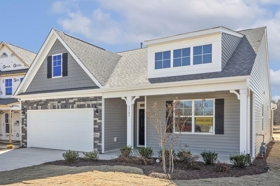 Front exterior of a new home in 1158 Place, Wilson, NC, highlighting curb appeal (Image 27).