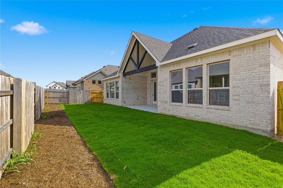 Exterior details and patio area of a home in Hawkes Landing, Leander (Image 14). Exterior details and patio area of a home in Hawkes Landing, Leander (Image 14).