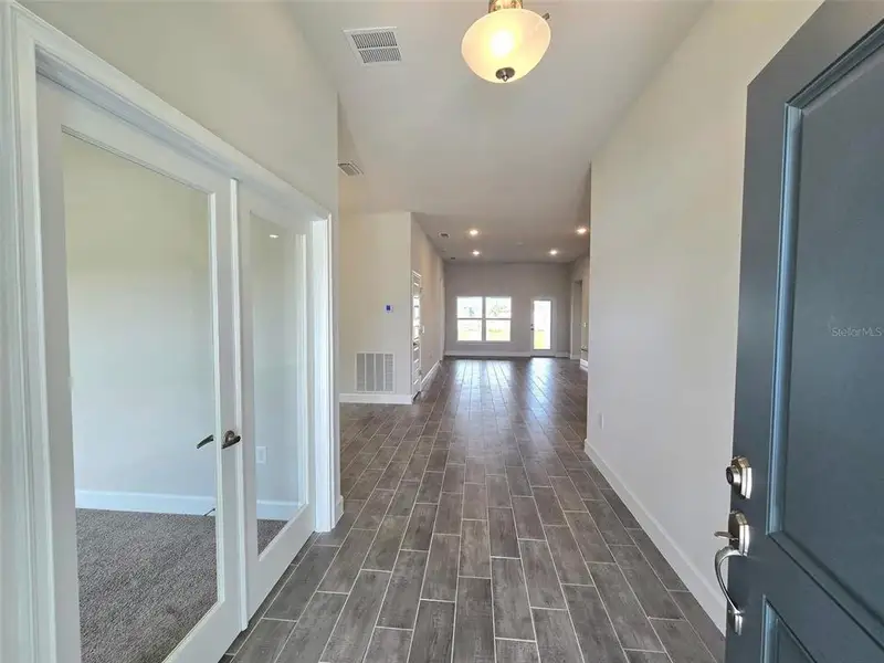 Furnished interior view inside a new home in Watercress Cove, North Port (Image 7). Furnished interior view inside a new home in Watercress Cove, North Port (Image 7).