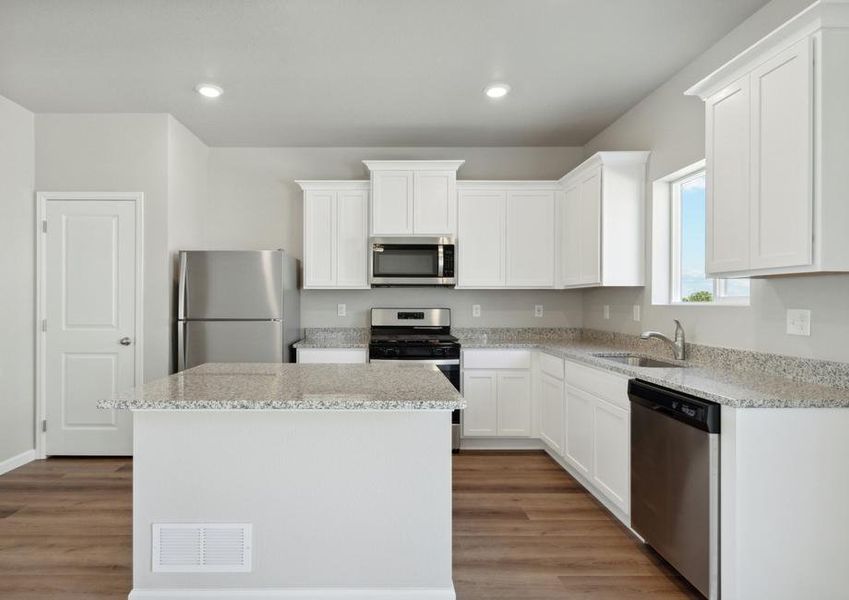 The kitchen of the Rio Grande has beautiful white cabinets.