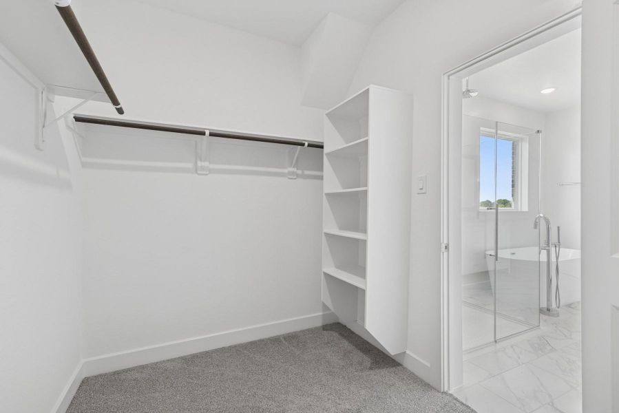 Primary walk-in closet (*Photo not of actual home and used for illustration purposes only.)