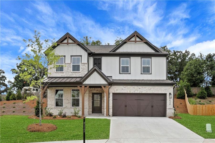 Front exterior of a new home in The Paddocks at Doc Hughes, Buford, GA, highlighting curb appeal (Image 24).