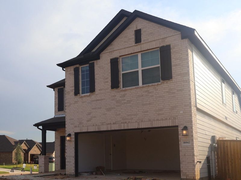 In-progress construction of a new home in Pinewood at Grand Texas, New Caney, TX (Image 35). In-progress construction of a new home in Pinewood at Grand Texas, New Caney, TX (Image 35).