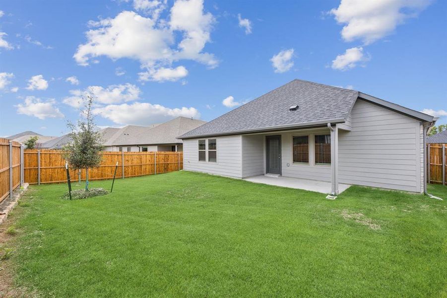 Patio in the Hayden home plan by Trophy Signature Homes – REPRESENTATIVE PHOTO