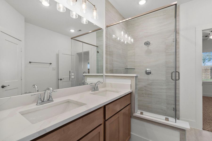 Furnished interior view inside a new home in Meridiana, Iowa Colony (Image 7).