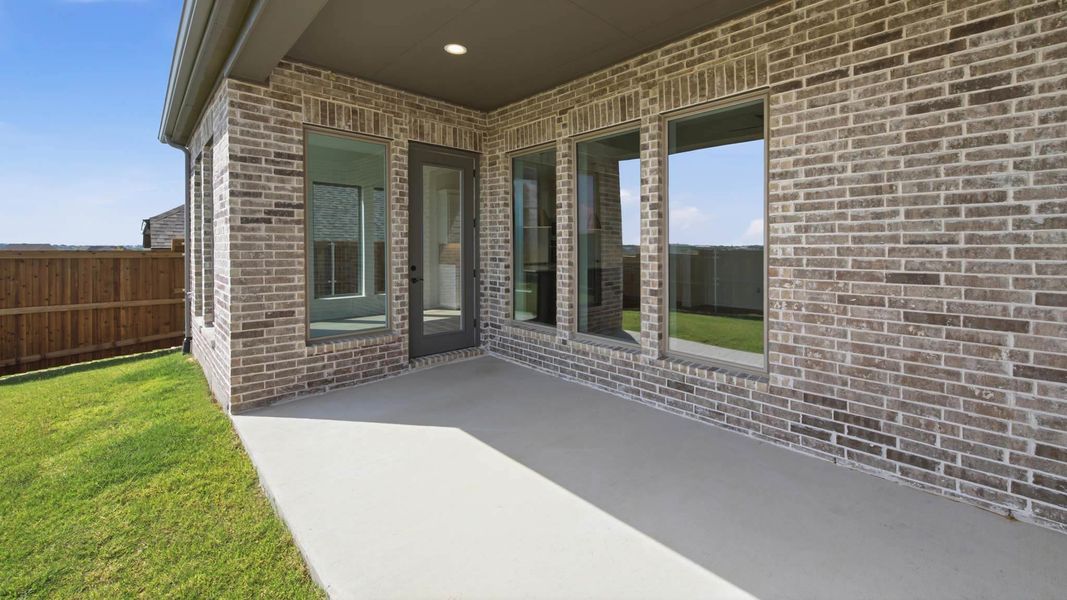 Exterior details and patio area of a home in Terraces, Rockwall (Image 3).