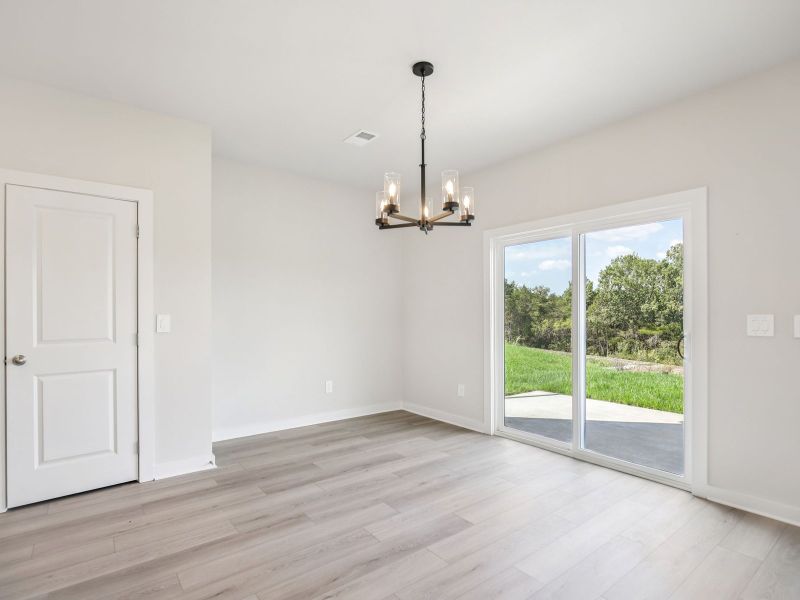 The open-concept floorplan allows for an easy flow between the kitchen and dining areas. The open-concept floorplan allows for an easy flow between the kitchen and dining areas.